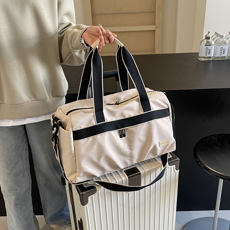 Дорожная сумка-дафл на колесик – обзор и цена Weekender Bag Duffle